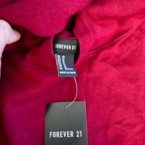 Brand new with tag Forever 21 burgundy sweater with hoodie
